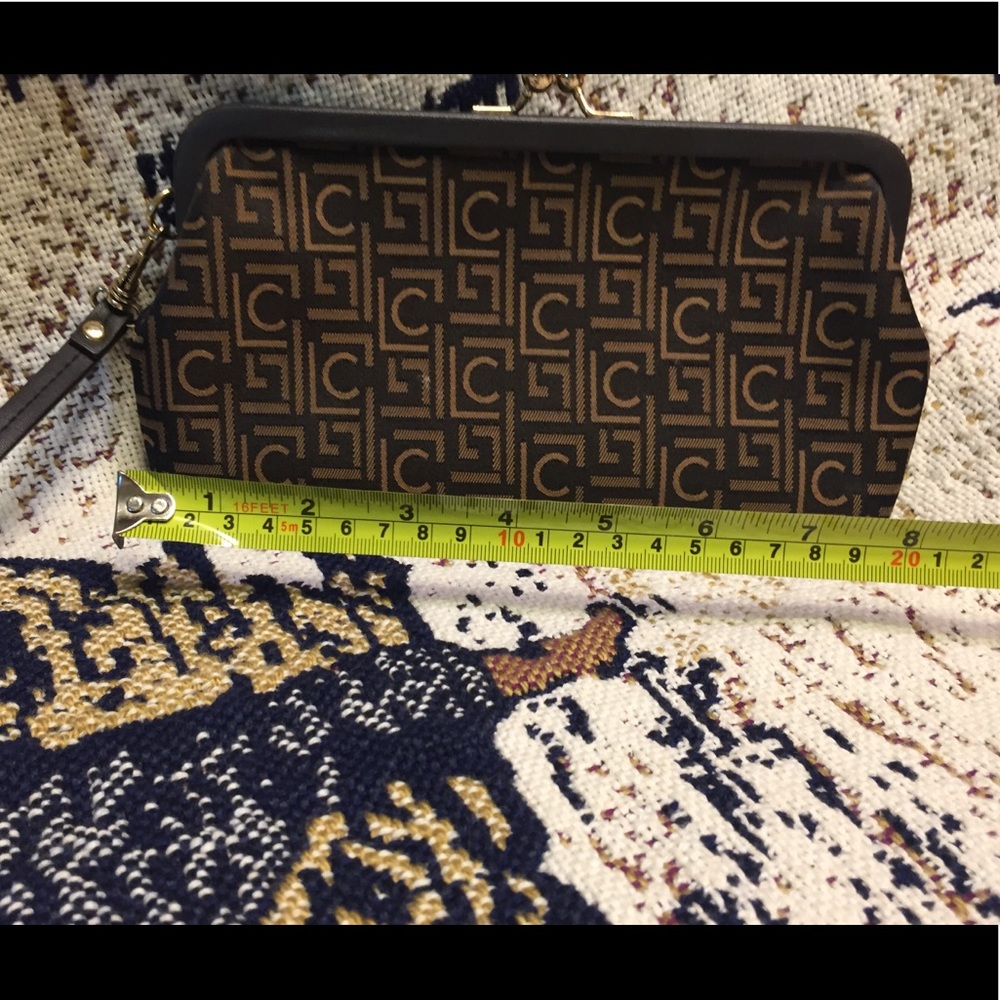 Brown clutch / wristlet by Liz Claiborne.